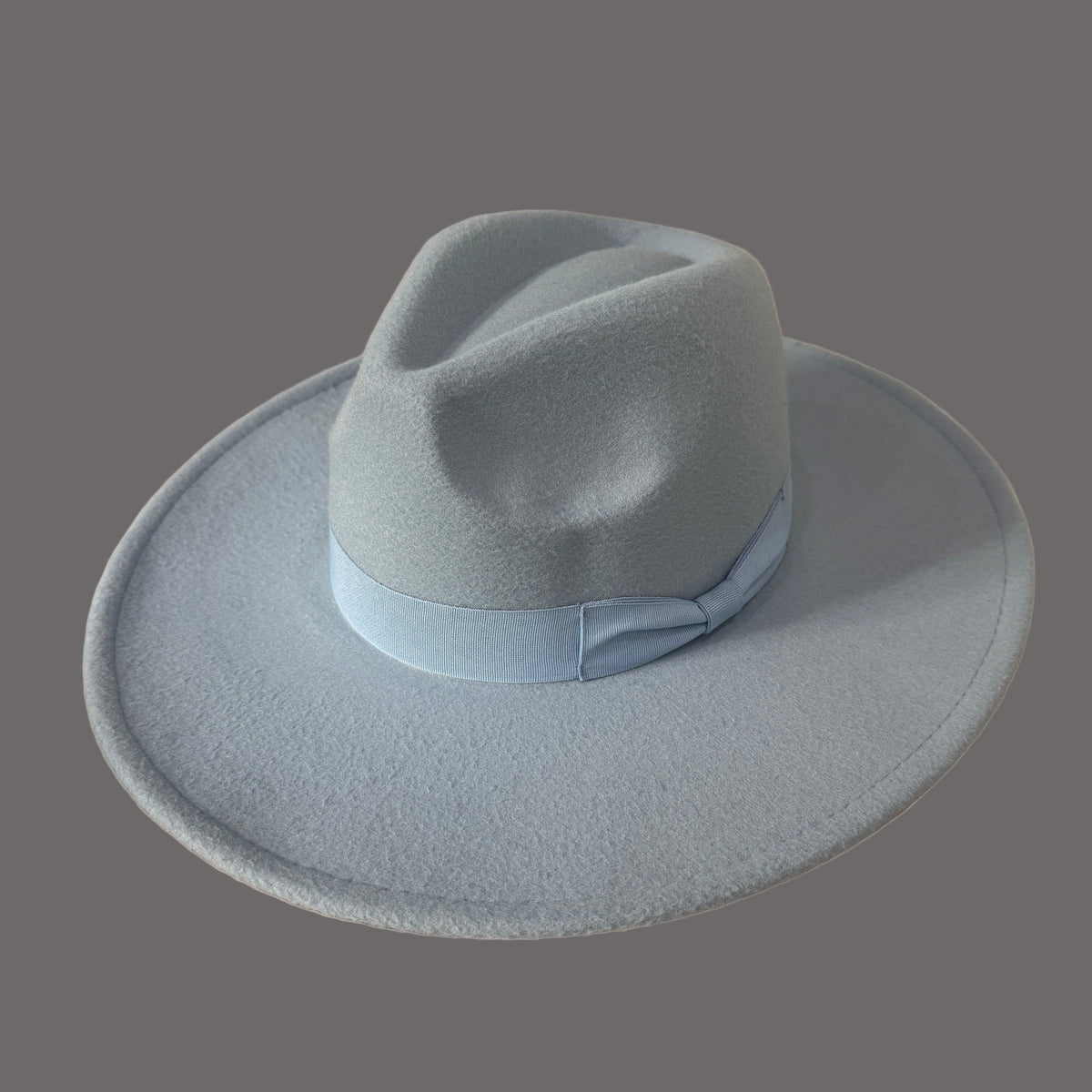 Dion light gray wide-brim fedora with a matching grosgrain bow band.