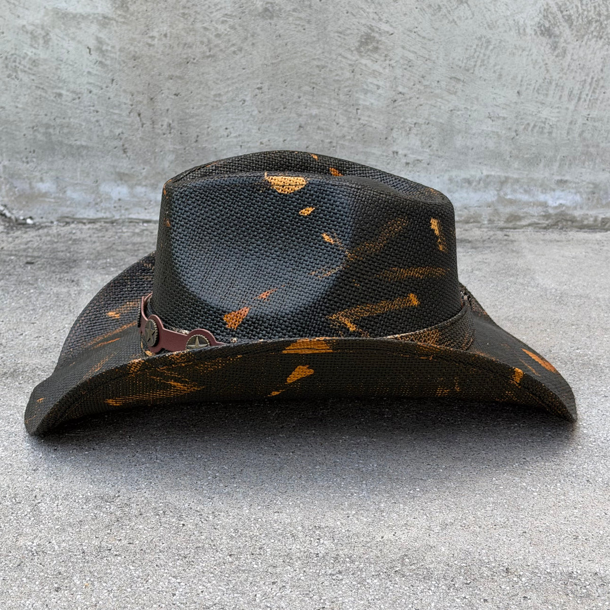 Side view of the Coyote cowboy hat on a gray background