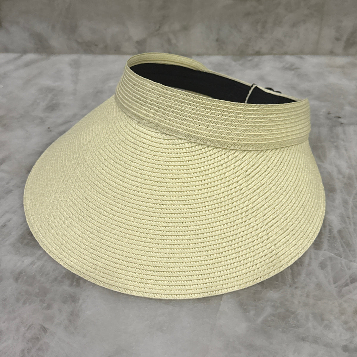 Beige Zara extra-wide brim sun visor with an open top and dark inner band.