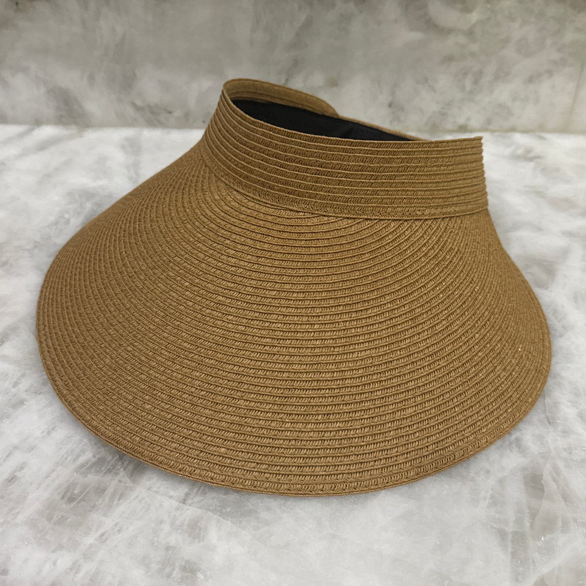 Dark natural Zara sun visor showing its woven texture and extra-wide brim.