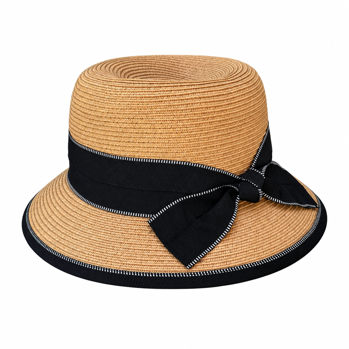 Tan Sophie bucket hat with a wide black ribbon bow and black brim trim on a white background on a white background
