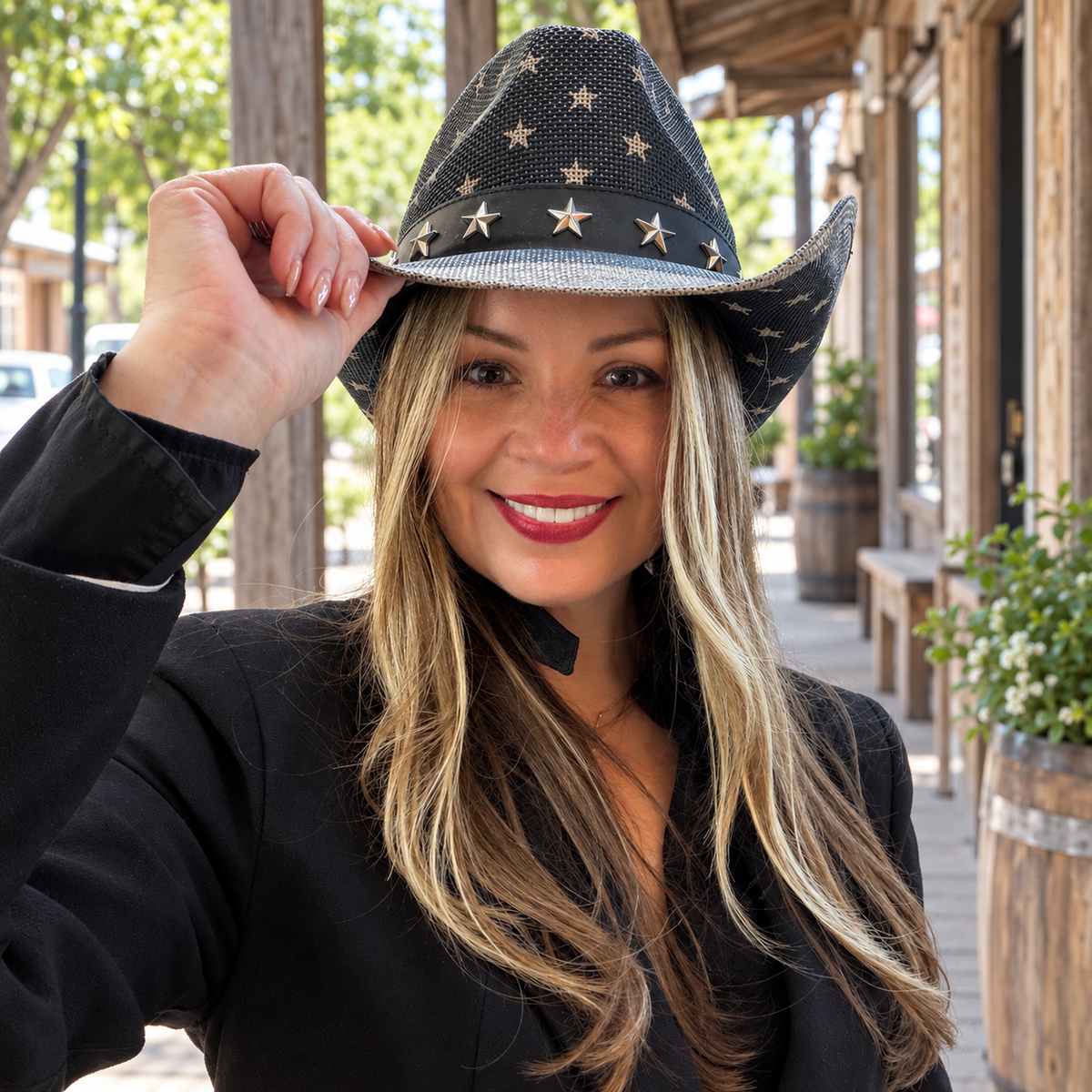 Woman wearing Star Rider Black cowboy hat on a shaded outdoor porch