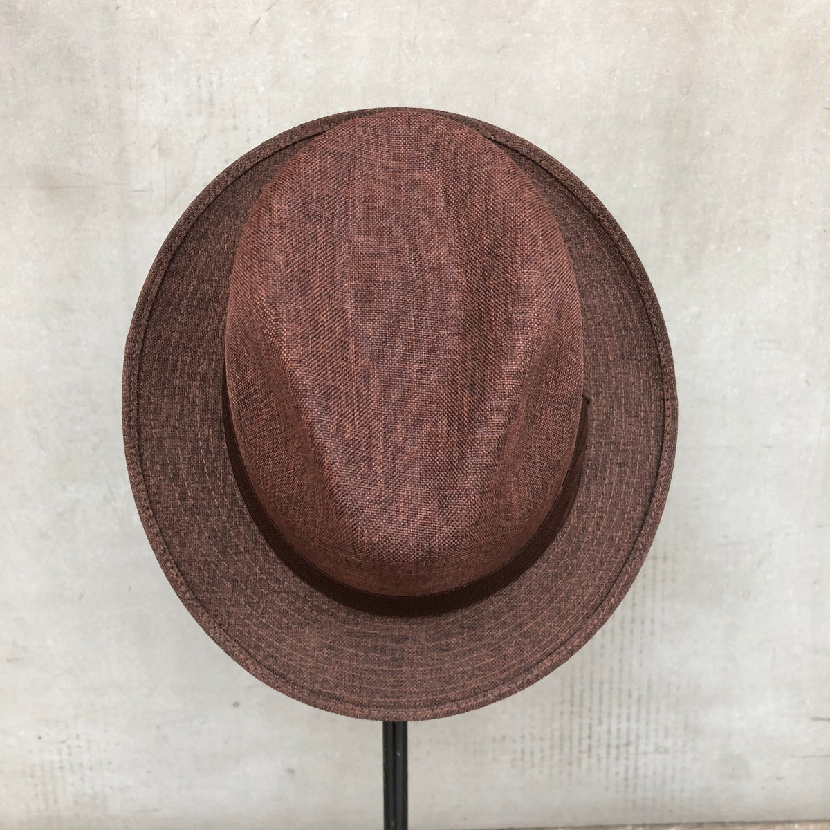 Top view of Mia brown fedora showing its pinched crown.